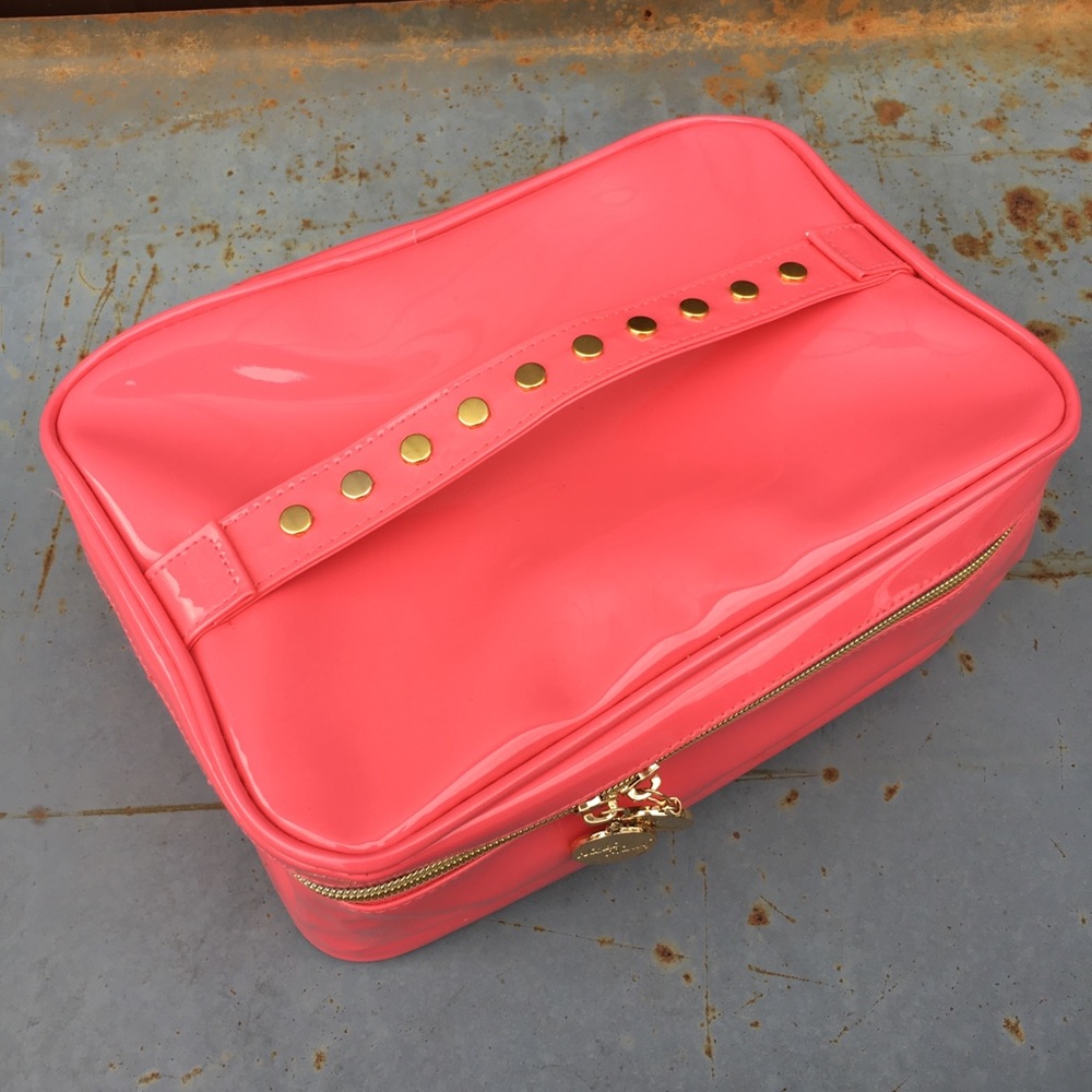 Neon pink Nicki Minaj travel case